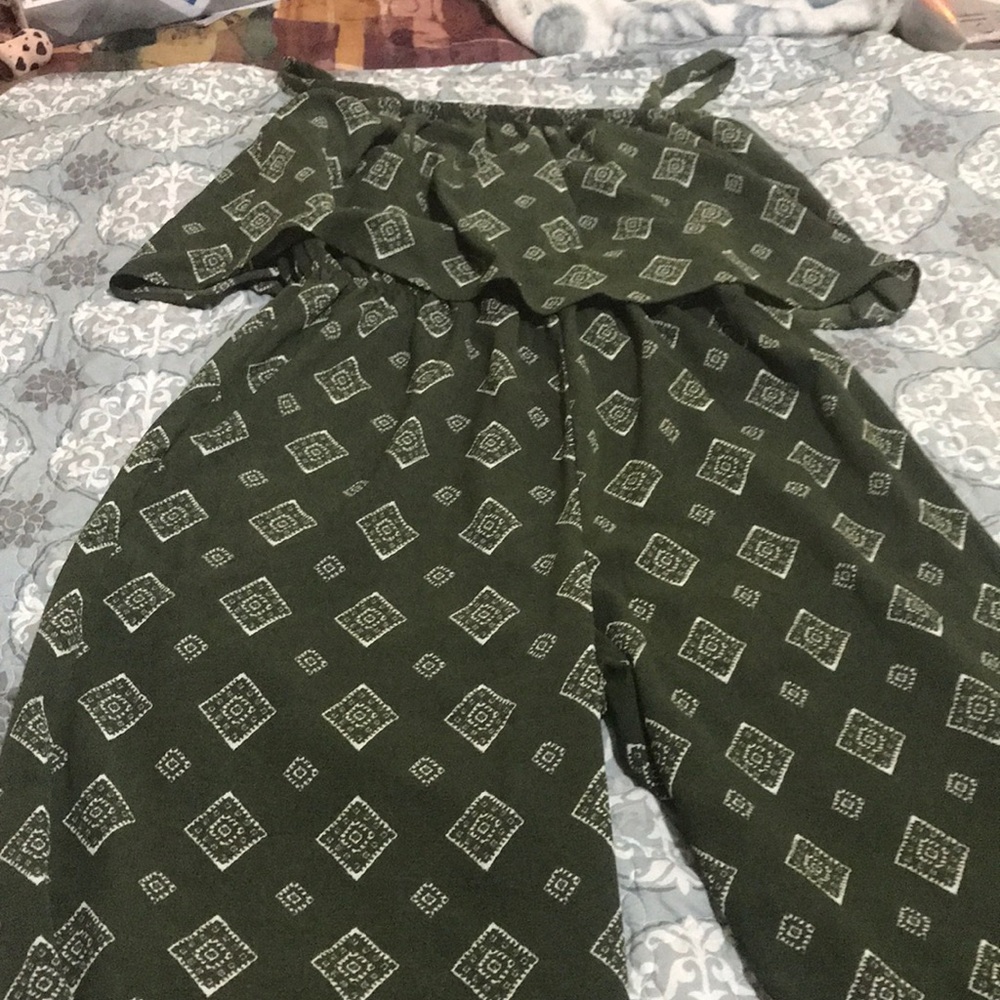 Green jumpsuit with designs